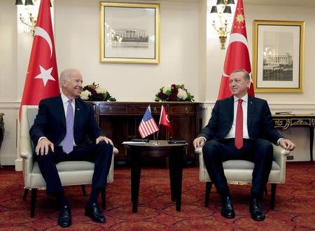 U.S. Vice President Joe Biden (L) attends a bilateral meeting with Turkish President Tayyip Erdogan in Washington March 31, 2016. REUTERS/Joshua Roberts