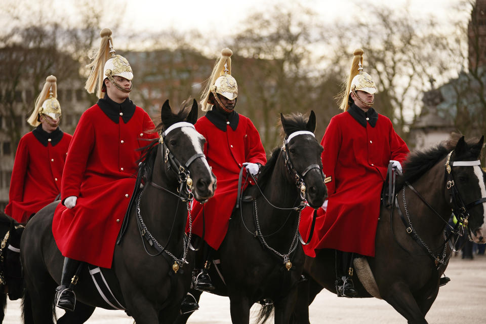 Members of the Royal Household Cavalry take part in the Changing of the Guard at Buckingham Palace, London, on the Platinum Jubilee of Queen Elizabeth II. Picture date: Sunday February 6, 2022. (Photo by Aaron Chown/PA Images via Getty Images)