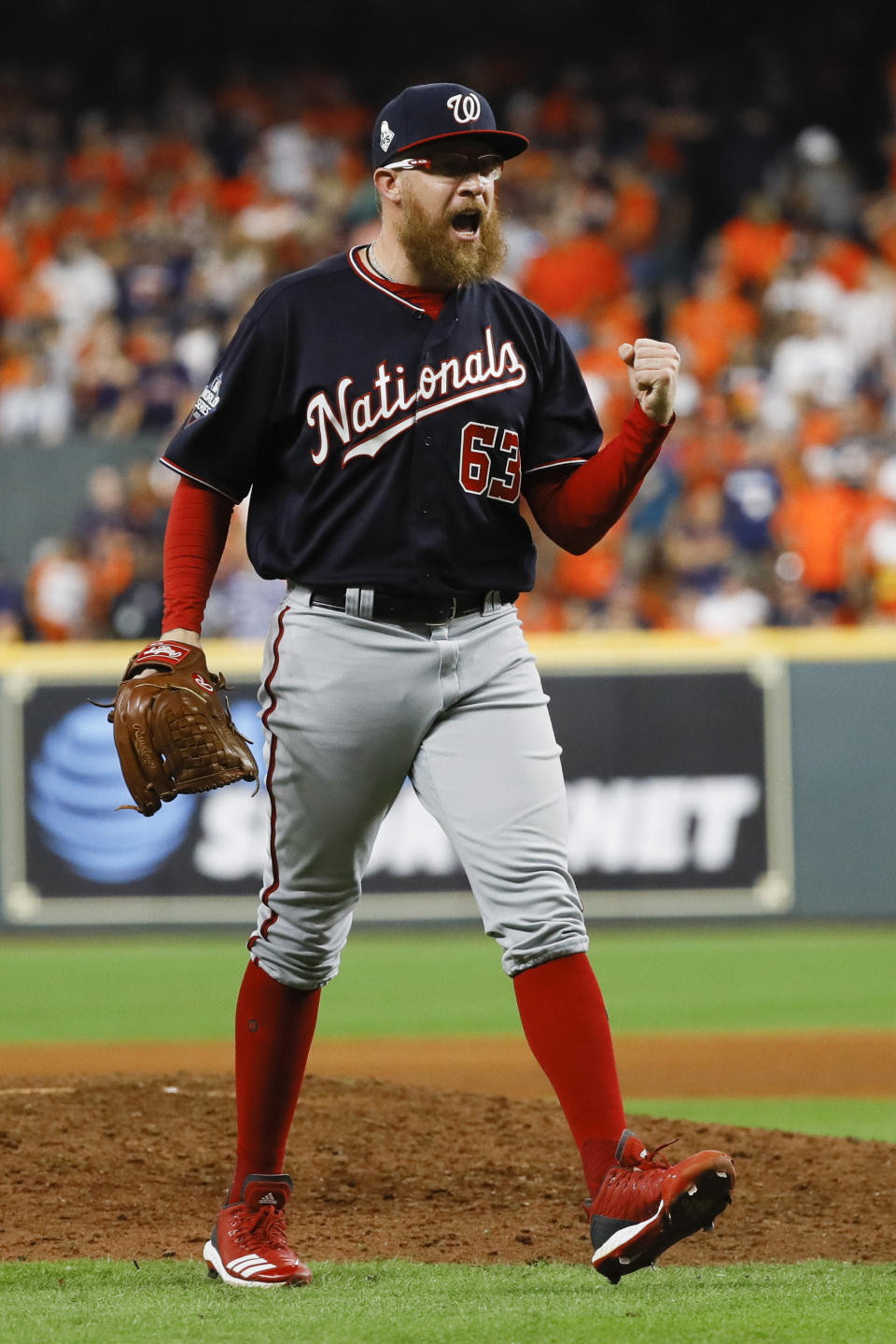 Washington Nationals relief pitcher Sean Doolittle celebrates after their win against the Houston Astros in Game 1 of the baseball World Series Tuesday, Oct. 22, 2019, in Houston. The Nationals won 5-4 to take a 1-0 lead in the series. (AP Photo/Matt Slocum)