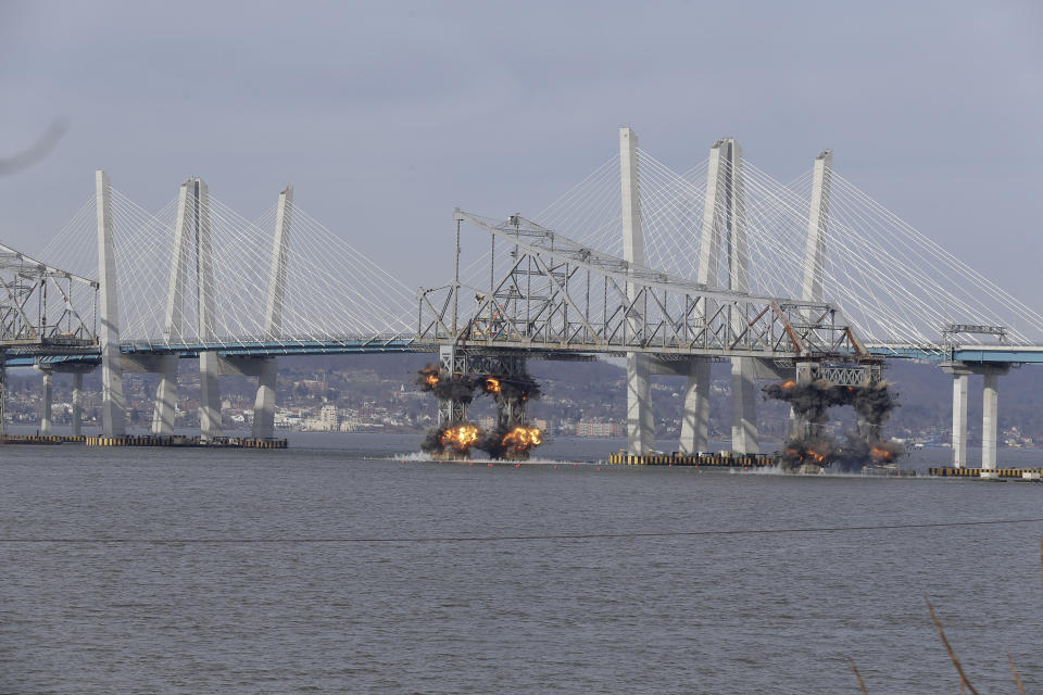 A section of the old Tappan Zee Bridge is brought down with explosives in this view from Tarrytown, N.Y., Tuesday, Jan. 15, 2019. (AP Photo/Seth Wenig)