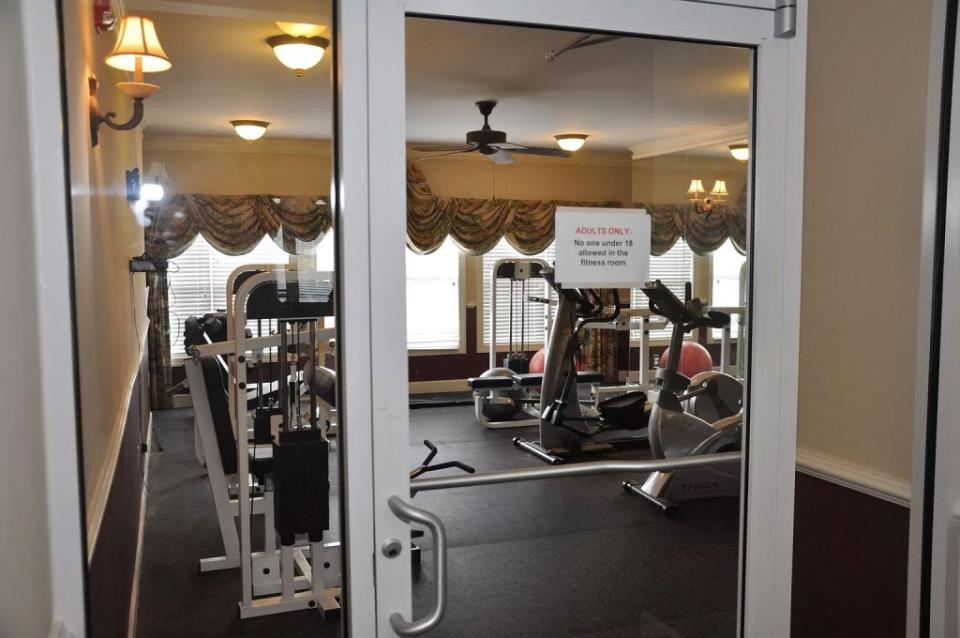 The building complex offers a fitness space. Dogwood Court Rentals