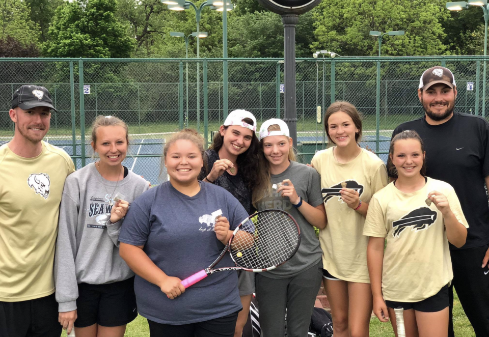 Ryan Walters (far left) and Chad Waller (far right) coached the girls tennis team at McAlester High. (McAlester Tennis)