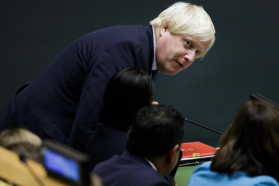 Foreign Secretary Boris Johnson arrives at his delegations table before a speech by Theresa May at the UN in New York (EPA)