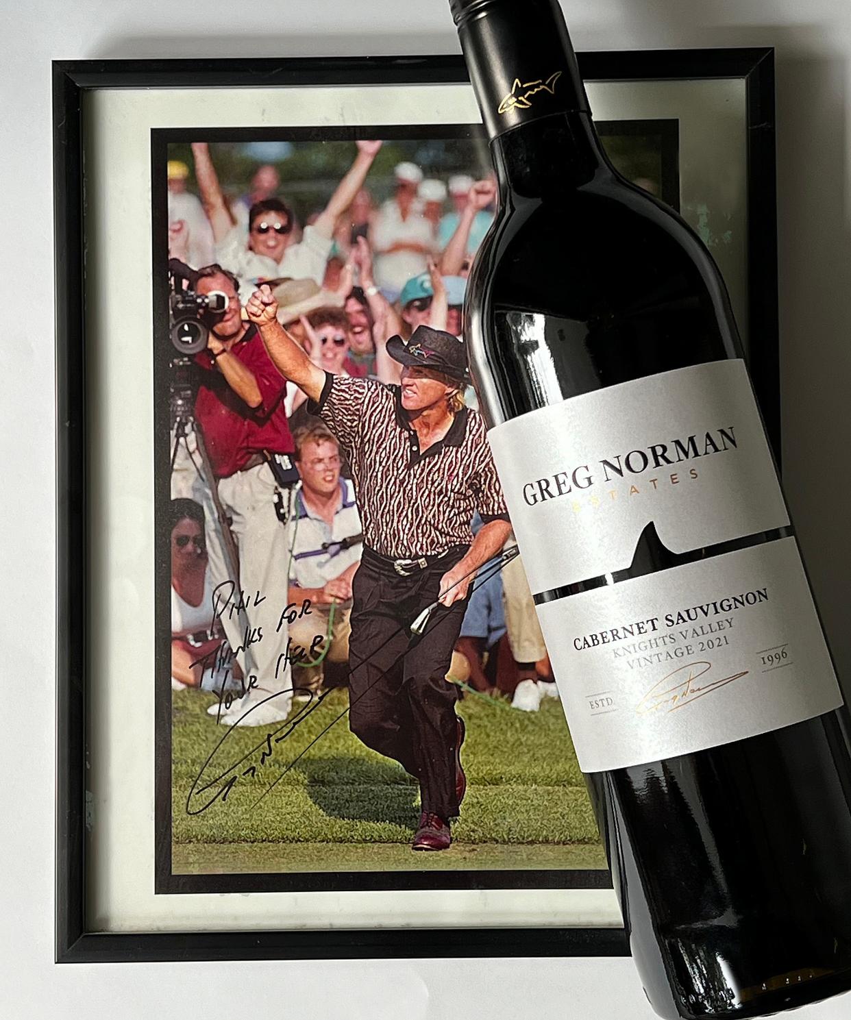 Greg Norman Knights Valley California cabernet pictured with a signed photo of the man himself.