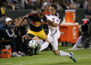 CARSON, CA - NOVEMBER 03: Dane Richards #19 of the New York Red Bulls battles for the ball with Todd Dunivant #2 of the Los Angeles Galaxy in their Western Conference Semifinal at The Home Depot Center on September 9, 2011 in Carson, California. The Galaxy won 2-1 to advance to the Conference Finals. (Photo by Stephen Dunn/Getty Images)