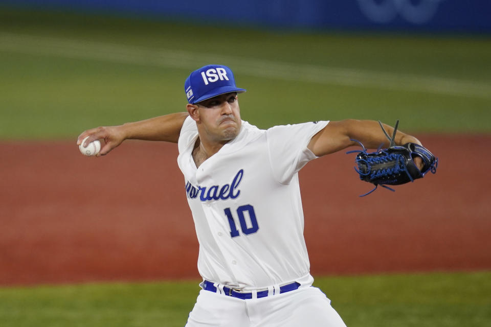 Israel's DJ Sharabi pitches during the fifth inning of a baseball game against the United States at the 2020 Summer Olympics, Friday, July 30, 2021, in Yokohama, Japan. (AP Photo/Sue Ogrocki)