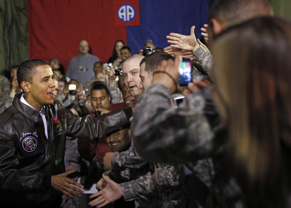 President Barack Obama meets with troops at Bagram Air Base in Kabul, March 28, 2010. Obama arrived unannounced in Afghanistan on Sunday in his first visit to the war zone. REUTERS/Jim Young