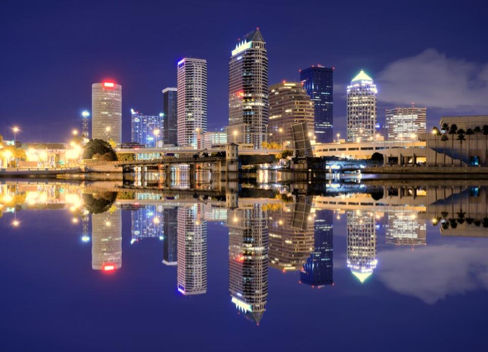 Skyline of downtown Tampa with reflection, Florida, USA via Getty Images