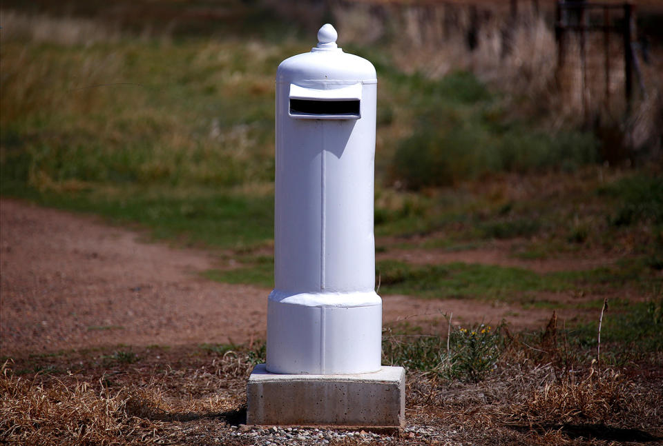 <p>An old cylinder previously used to cover an electricity box has been converted into a mailbox in the outskirts of Gunnedah township, northwest of Sydney, Australia. (Photo: David Gray/Reuters) </p>