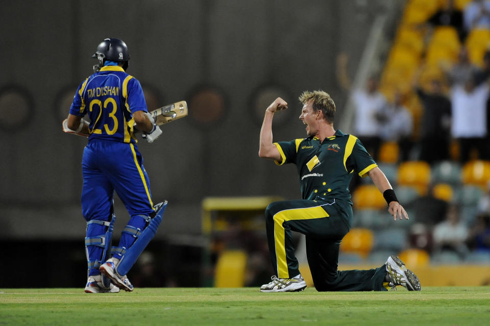 Brett Lee of Australia celebrates taking the wicket of Tillakaratne of Sri Lanka during the first One Day International final match between Australia and Sri Lanka at The Gabba on March 4, 2012 in Brisbane, Australia.