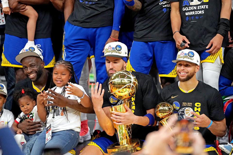 Golden State Warriors forward Draymond Green, guard Klay Thompson and guard Stephen Curry celebrate after beating the Boston Celtics in Game 6 of the 2022 NBA Finals to win the NBA championship at TD Garden in Boston on June 16. 2022. (Kyle Terada/USA TODAY Sports)