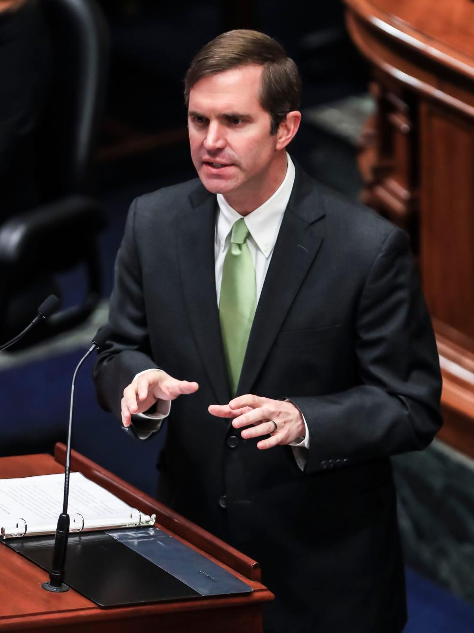 Gov. Andy Beshear speaks during his 2022 budget address at the state Capitol. Beshear says his proposal is Kentucky's chance "not just to tread water, but to lead." Jan. 13, 2022