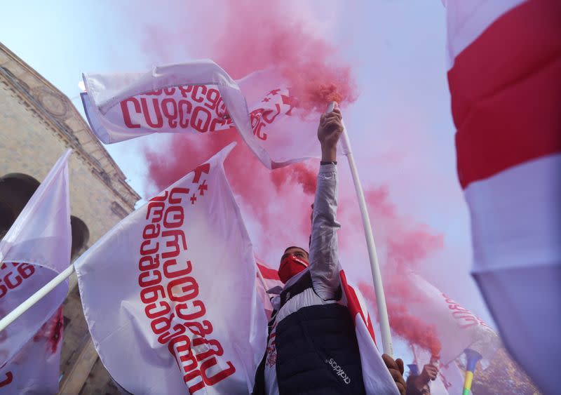 Opposition supporters protest against results of a parliamentary election