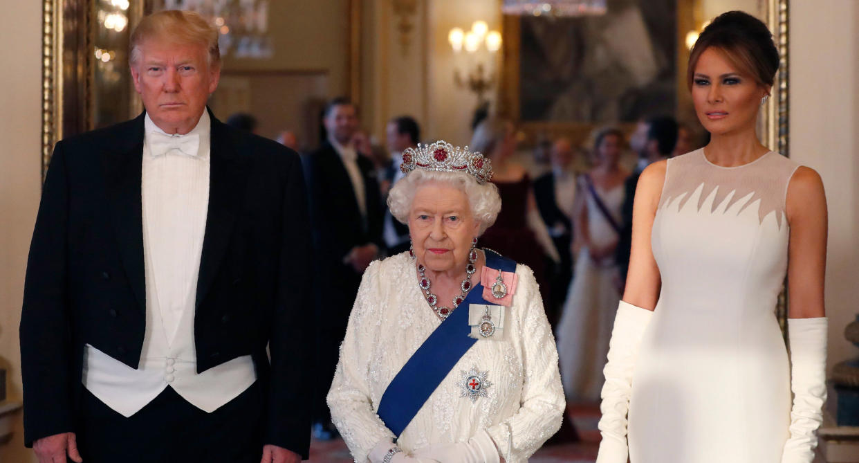 President Trump, Queen Elizabeth and Melania Trump (ALASTAIR GRANT/AFP/Getty Images).