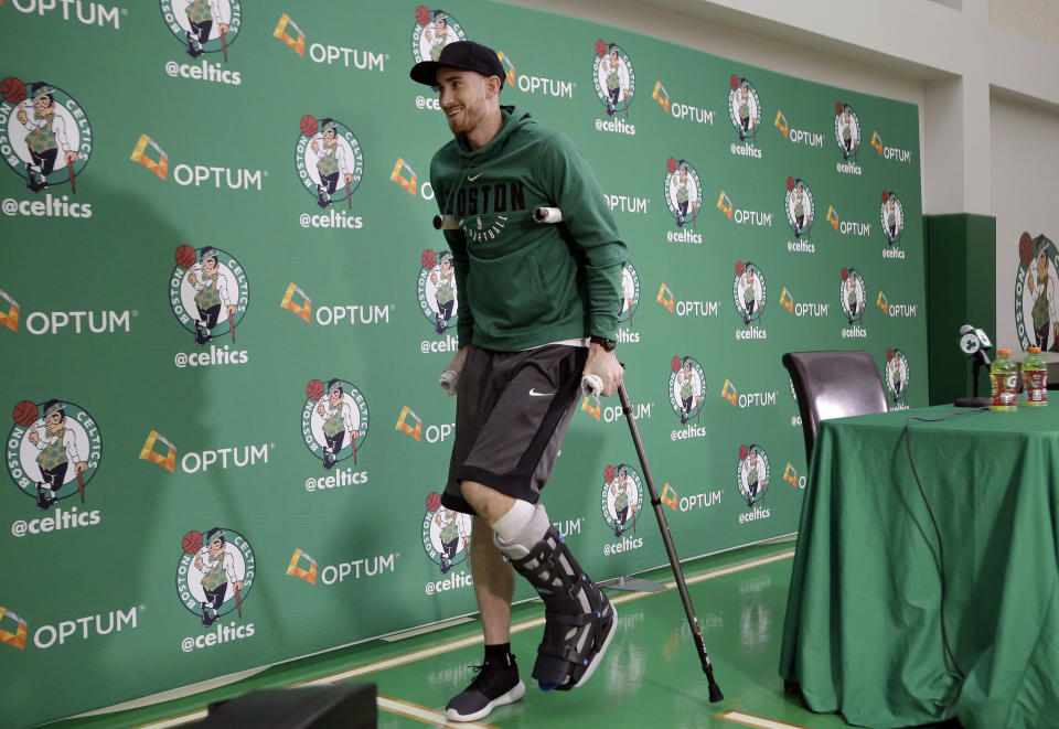 Gordon Hayward uses his crutches to leave his news conference Thursday. (AP)