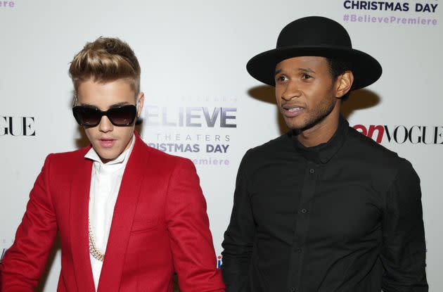 Usher and Bieber, seen here at the 