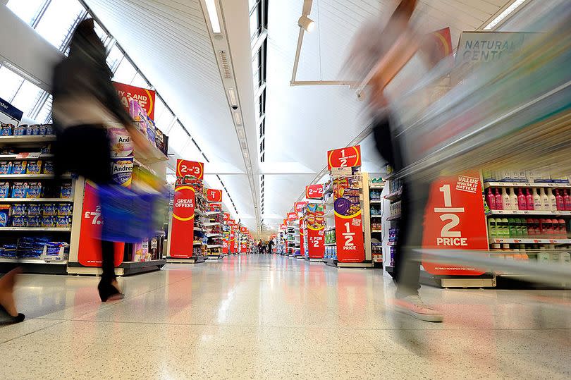 LONDON, ENGLAND - OCTOBER 10:  Rushing to bag a bargain - shoppers hit the aisles as new research from Sainsbury’s reveals that Britain’s bargain hunters spend 64 days, and cover the distance of the equator, in their lifetime traipsing the aisles to bag the best deals with loo roll being one of the most sought after bargains. The research coincides with the national launch of Sainsbury’s Brand Match, due to hit UK stores Wednesday, 12th October 2011 on October 10, 2011 in London, England.  (Photo by Gareth Cattermole/Getty Images for Sainsburys)