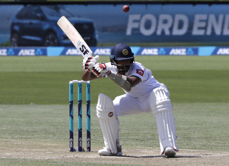Sri Lanka's Dinesh Chandimal ducks to avoid a bouncer during play on day four of the second cricket test between New Zealand and Sri Lanka at Hagley Oval in Christchurch, New Zealand, Saturday, Dec. 29, 2018. (AP Photo/Mark Baker)