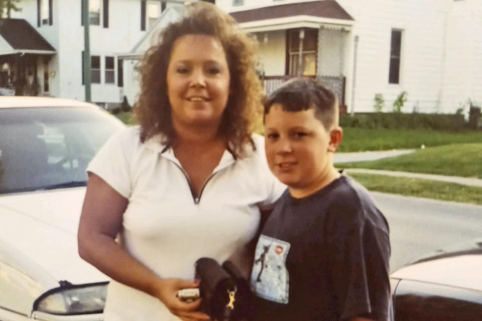 This undated photo provided by Diane Urban, shows her and her son Jordan Garmatter. After watching President Donald Trump target the son of former Vice President Joe Biden for his history of substance abuse, Urban, a Republican from Delphos, Ohio, was reminded again of the shame her son lived with during his own battle with addiction. As Trump nears the end of his first term, some supporters, including Urban, feel left behind by his administration's drug policies. (Courtesy of Diane Urban via AP)