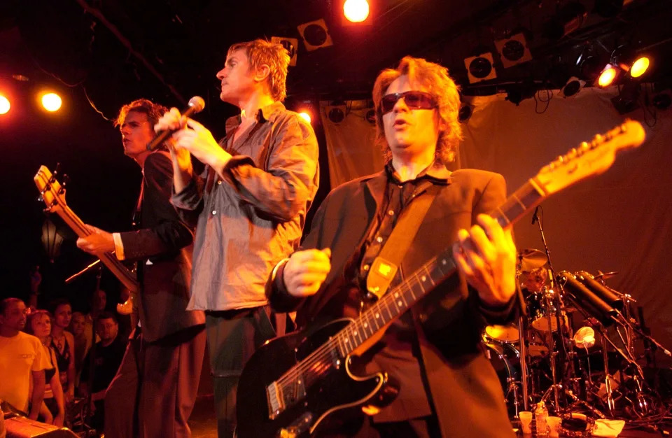 Andy Taylor performing at Duran Duran's reunion show at the Roxy in Los Angeles in 2003. (Kevin Mazur/WireImage via Getty Images)