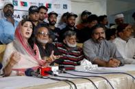 Syeda Shehla Raza (L), nominated candidate of Pakistan Peoples Party (PPP) for the National Assembly seat from Karachi, speaks with party workers during a campaign meeting ahead of general elections in Karachi, Pakistan July 10, 2018. Picture taken July 10, 2018. REUTERS/Akhtar Soomro
