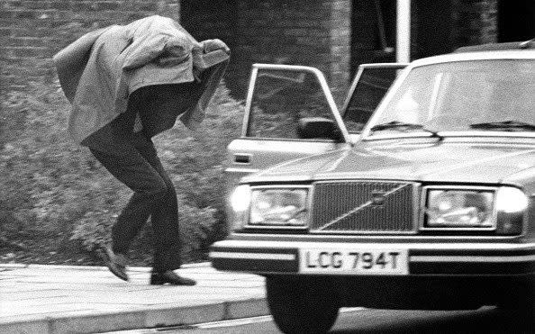 John Stonehouse makes a dash to a waiting car as he leaves Norwich Prison in 1979 - Bryn Colton