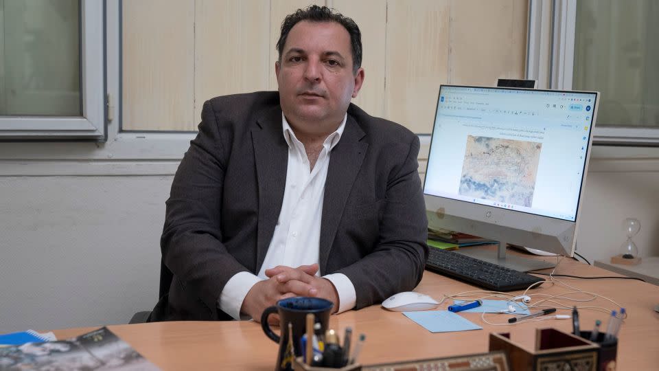 Syrian lawyer and human rights defender Mazen Darwish poses for a photo in his Paris office. - Mark Esplin/CNN