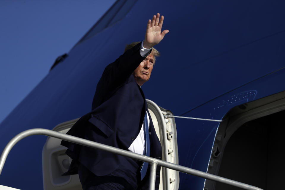 President Donald Trump boards Air Force One at Marine Corps Air Station Miramar, Wednesday, Sept. 18, 2019, in San Diego, Calif. (AP Photo/Evan Vucci)