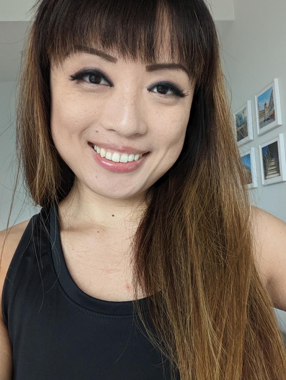 <p>A picture from the Pixel 6a's front camera, featuring a woman smiling.</p>
