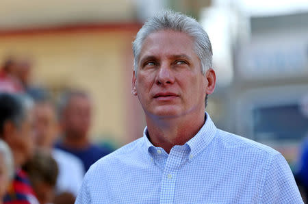 FILE PHOTO: Cuba's First Vice-President Miguel Diaz-Canel stands in line before casting his vote during an election of candidates for the national and provincial assemblies, in Santa Clara, Cuba March 11, 2018. REUTERS/Alejandro Ernesto/Pool/File Photo