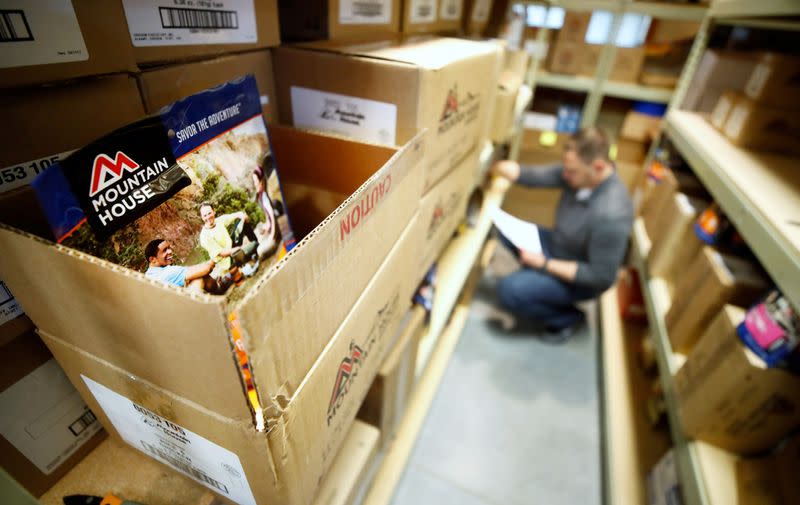 Freeze dried food sits on a shelf as an employee gathers items for personal protection and survival equipment kits ordered by customers preparing against novel coronavirus, at Nitro-Pak in Midway