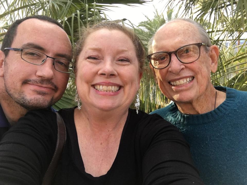 Monica Sierra Satcher with her father, Clement Michael Satcher, right, and husband, Martin Sierra, left, after a 2019 dinner in Palm Springs.