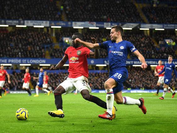 Eric Bailly holds off Chelsea captain Cesar Azpilicueta (Getty)