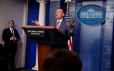 White House chief of staff Mick Mulvaney announces the decision - Credit: Evan Vucci&nbsp;/AP