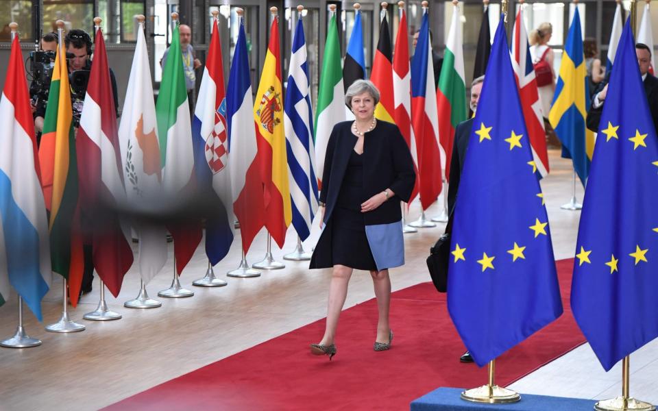 Britain's Prime Minister Theresa May (L) arrives at the Europa Building, the main headquarters of European Council, in Brussels ahead of the EU leaders summit, in Brussels, on June 22, 2017. - Credit: AFP