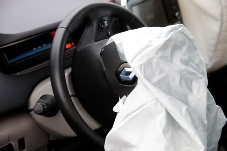 An airbag of a Renault Zoe electric car is seen after collision with an oncoming Volvo V70 car in a controlled crash test from insurer AXA in Duebendorf