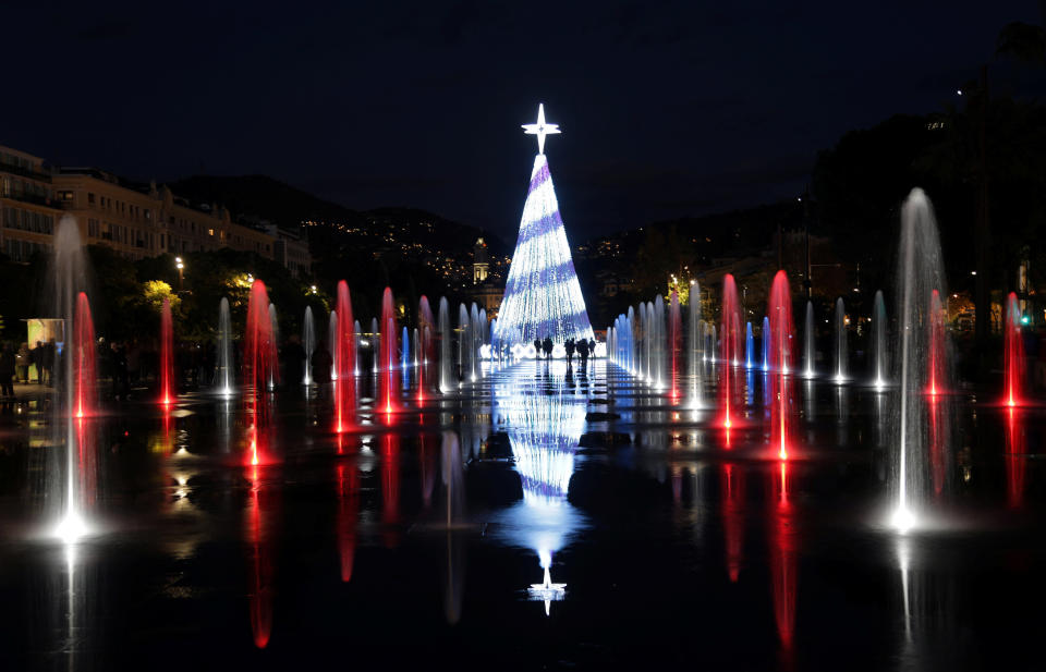 An illuminated Christmas tree and fountains are seen in Nice, France, on Dec. 3, 2017.