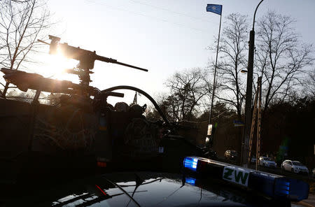 A convoy of troops, a part of NATO's reinforcement of its eastern flank, who are on their way from Germany to Orzysz in northeast Poland, drives through Sulejowek towards a military base in Wesola, near Warsaw, Poland, March 28, 2017. REUTERS/Kacper Pempel