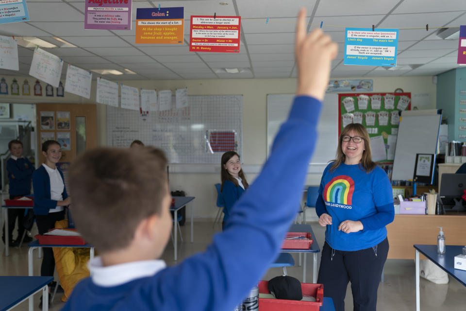 STAFFORDSHIRE, June 8, 2020 -- Teacher Dawn Burrows gets ready for a maths class with her Year 6 pupils from Landywood Primary School in a socially distanced classroom in Staffordshire, Britain on June 8, 2020.   As part of the government's easing lockdown measures, most primary schools in England reopened to more pupils on June 1. (Photo by Jon Super/Xinhua via Getty) (Xinhua/Jon Super via Getty Images)