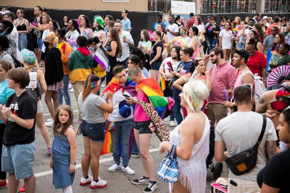 Families and groups of friends walk around as dance music plays at OutFest in Columbia, South Carolina on Saturday, June 6, 2021. The LGBT pride festival was cancelled last year to prevent the spread of the coronavirus.