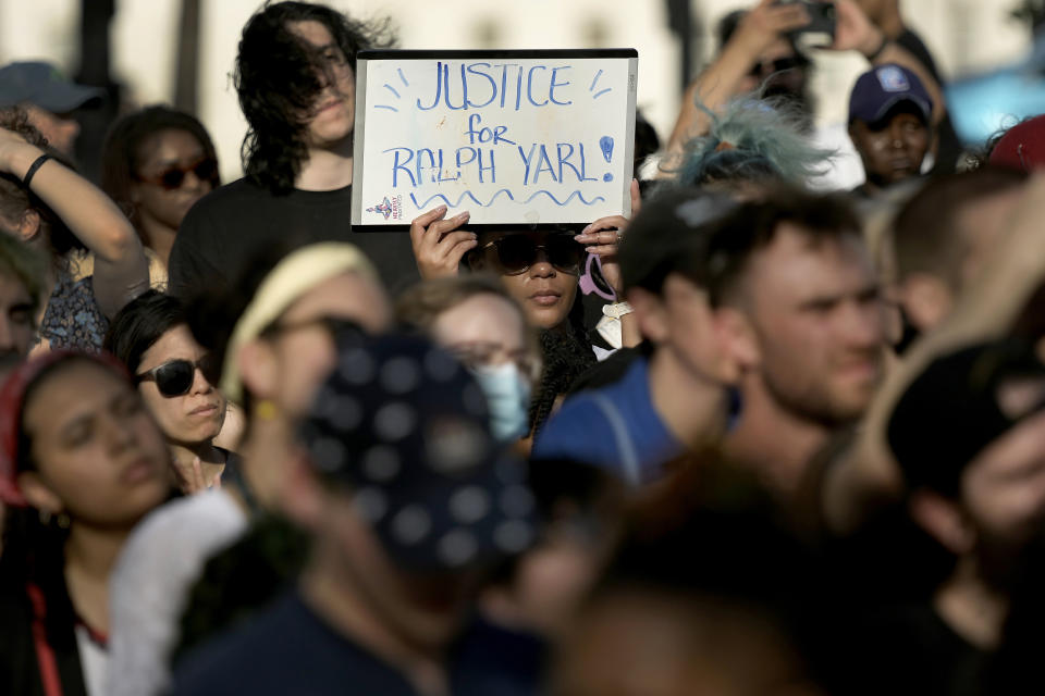 People attend a rally to support Ralph Yarl, Tuesday, April 18, 2023, in Kansas City, Mo. Yarl, a Black teenager, was shot last week by a white homeowner when he mistakenly went to the wrong address to pick up younger brothers. (AP Photo/Charlie Riedel)