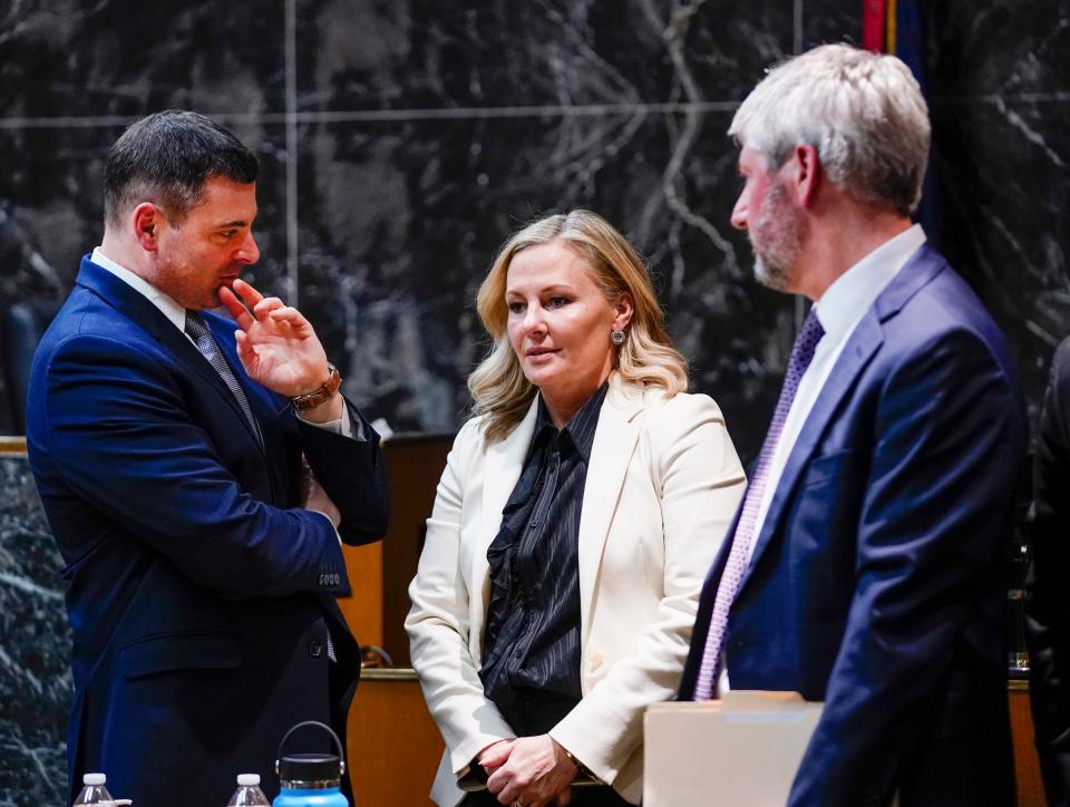 Oakland County Assistant Prosecutor Marc Keast, left, speaks with Oakland County Prosecutor Karen McDonald and Oakland County Assistant Prosecutor David Williams during James Crumbley's trial on Thursday, March 7, 2024.