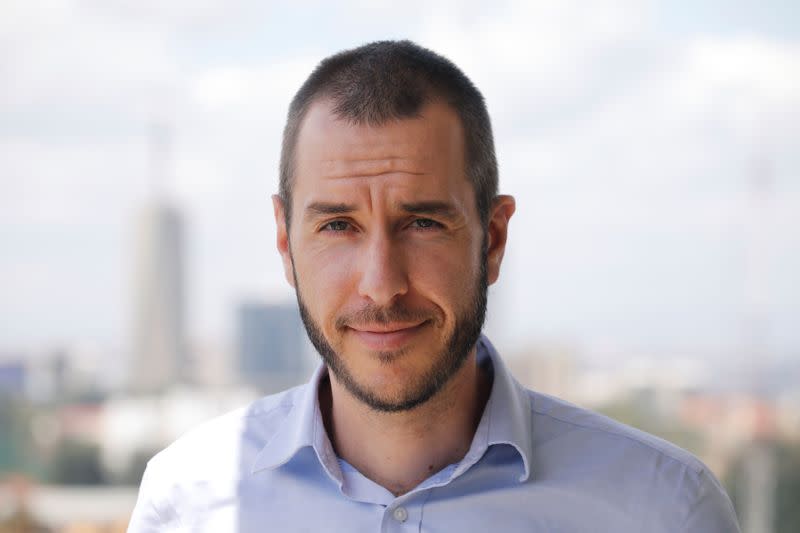 Jason Carmichael, CEO & Co-Founder of the Nairobi-based TIBU startup, poses for a photo during an interview with Reuters at the office in Nairobi