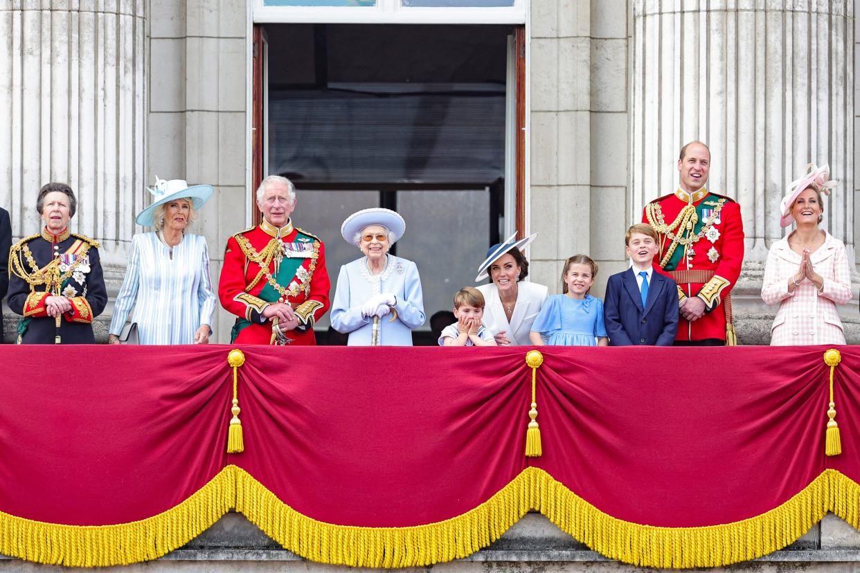 (L-R) Princess Anne, Princess Royal, Camilla, Duchess of Cornwall, Prince Charles, Prince of Wales, Queen Elizabeth II, Prince Louis of Cambridge, Catherine, Duchess of Cambridge, Princess Charlotte of Cambridge, Prince George of Cambridge, Prince William, Duke of Cambridge and Sophie, Countess of Wessex on the balcony of Buckingham Palace watch the RAF flypast during the Trooping the Colour parade on June 02, 2022, in London, England. The Platinum Jubilee of Elizabeth II is being celebrated from June 2 to June 5, 2022, in the UK and Commonwealth to mark the 70th anniversary of the accession of Queen Elizabeth II on 6 February 1952.