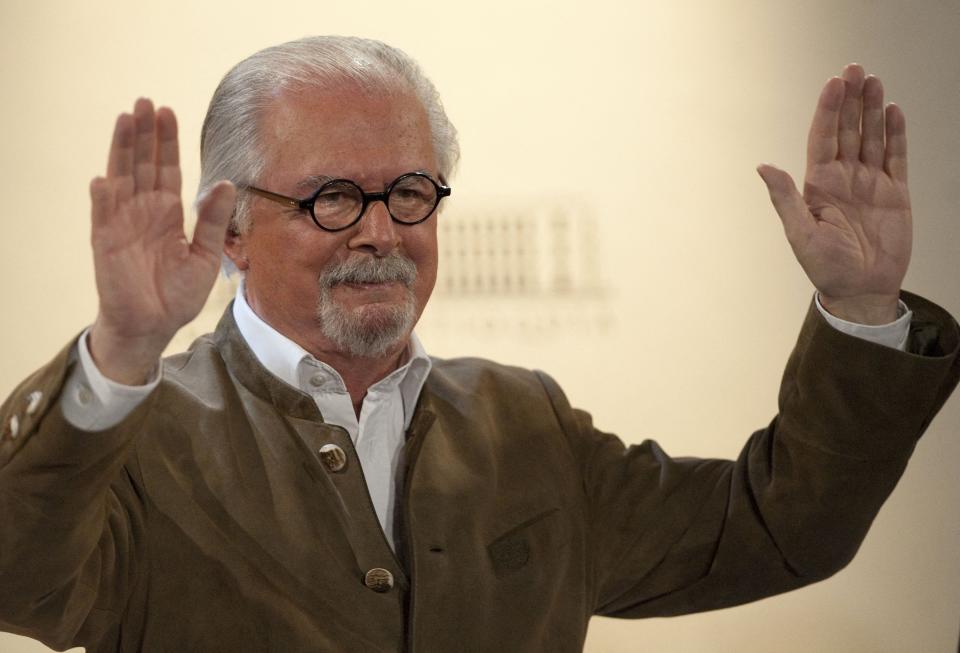 Colombian artist Fernando Botero gestures on Jan. 22, 2013 during the launch of the books "Botero, 80 years" by Colombian Santiago Velez, and "Fernando Botero, The Search for the Style, 1949-1963" by Colombian Christian Padilla at the Antioquia museum in Medellin.