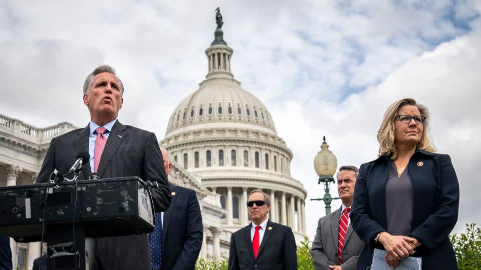 WASHINGTON, DC - MAY 27: At right, Rep. Liz Cheney (R-WY) stands with House Minority Leader Rep. Kevin McCarthy (R-CA) as he speaks during a news conference outside the U.S. Capitol, on May 27, 2020 in Washington, DC. Calling it unconstitutional, Republican leaders have filed a lawsuit against House Speaker Nancy Pelosi and congressional officials in an effort to block the House of Representatives from using a proxy voting system to allow for remote voting during the coronavirus pandemic. (Photo by Drew Angerer/Getty Images) - Drew Angerer/Getty Images