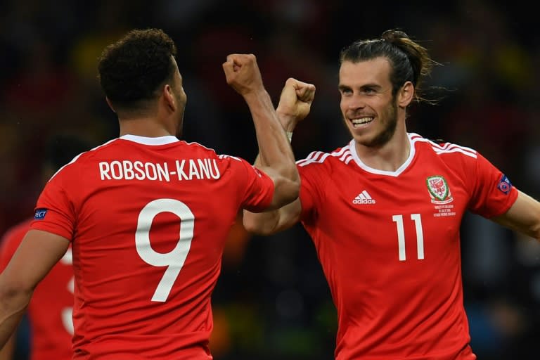 Wales forward Hal Robson-Kanu (L) celebrates after scoring a goal with Gareth Bale (R) during the Euro 2016 quarter-final against Belgium, on July 1, 2016