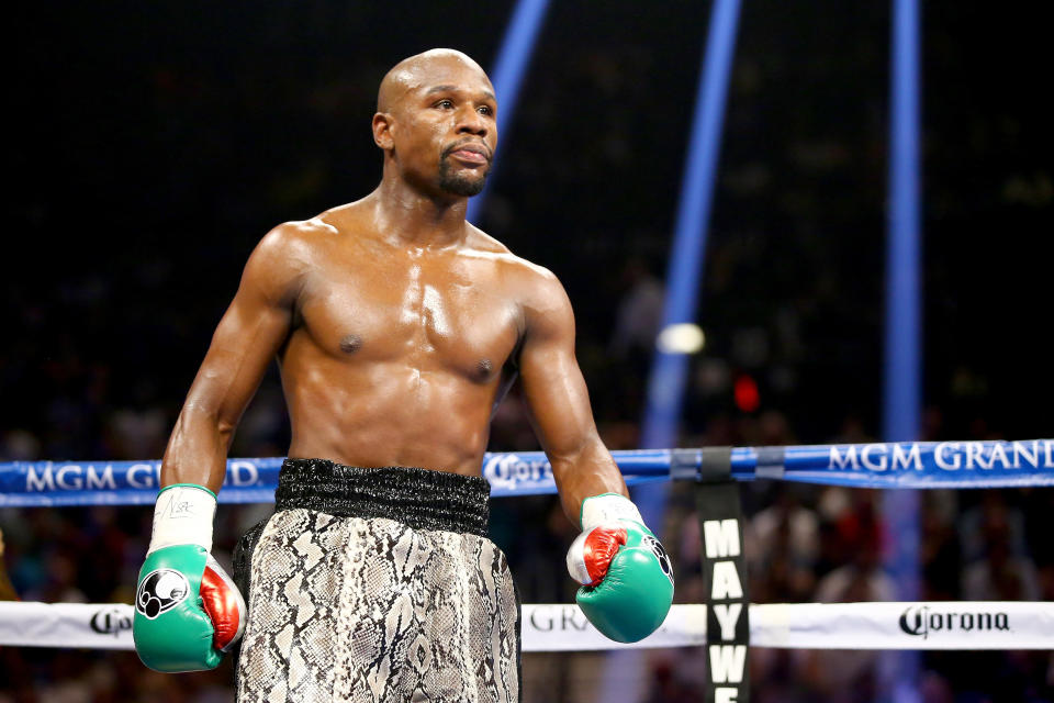 LAS VEGAS, NV - SEPTEMBER 13:  Floyd Mayweather Jr. looks on while taking on Marcos Maidana during their WBC/WBA welterweight title fight at the MGM Grand Garden Arena on September 13, 2014 in Las Vegas, Nevada.  (Photo by Al Bello/Getty Images)