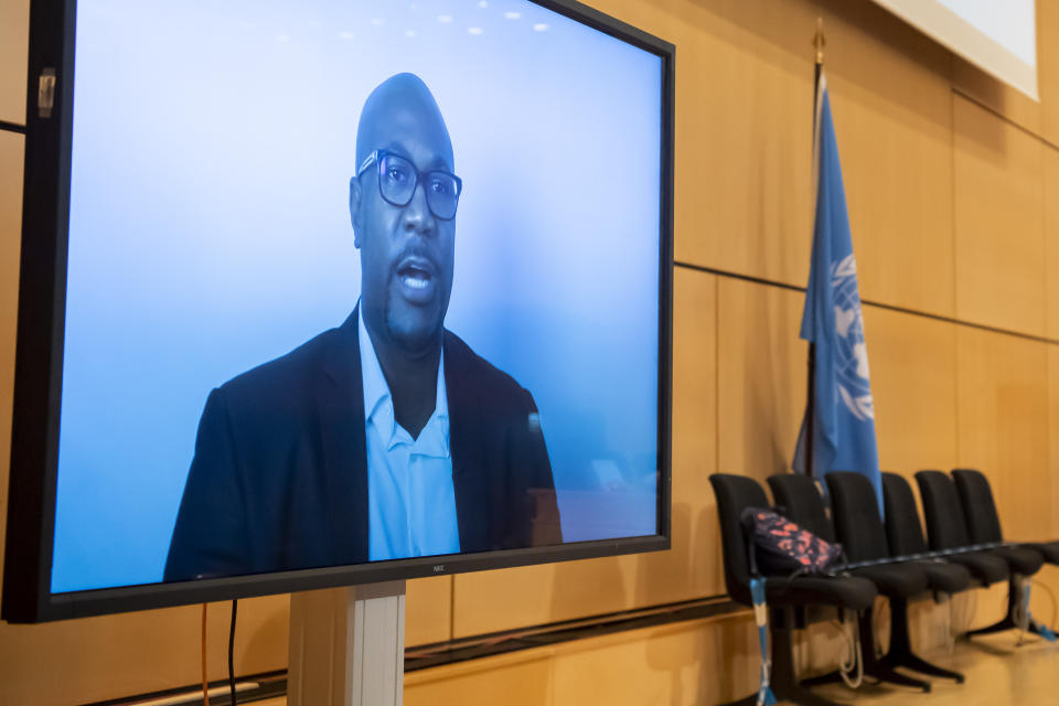 CORRECTS SLUG TO SWITZERLAND GEORGE FLOYD --- Philonise Floyd, left, brother of George Floyd speaks (via video message) at the Human Rights Council of the United Nations in Geneva, Switzerland, Wednesday, June 17, 2020 during an urgent debate on current racially inspired human rights violations, systematic racism, police brutality against people of African descent and violence against peaceful protests. (Martial Trezzini/Keystone via AP, Pool)