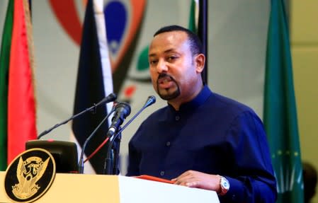 Ethiopia's Prime Minister Abiy Ahmed addresses delegates during the signing of the Sudan's power sharing deal, in Khartoum